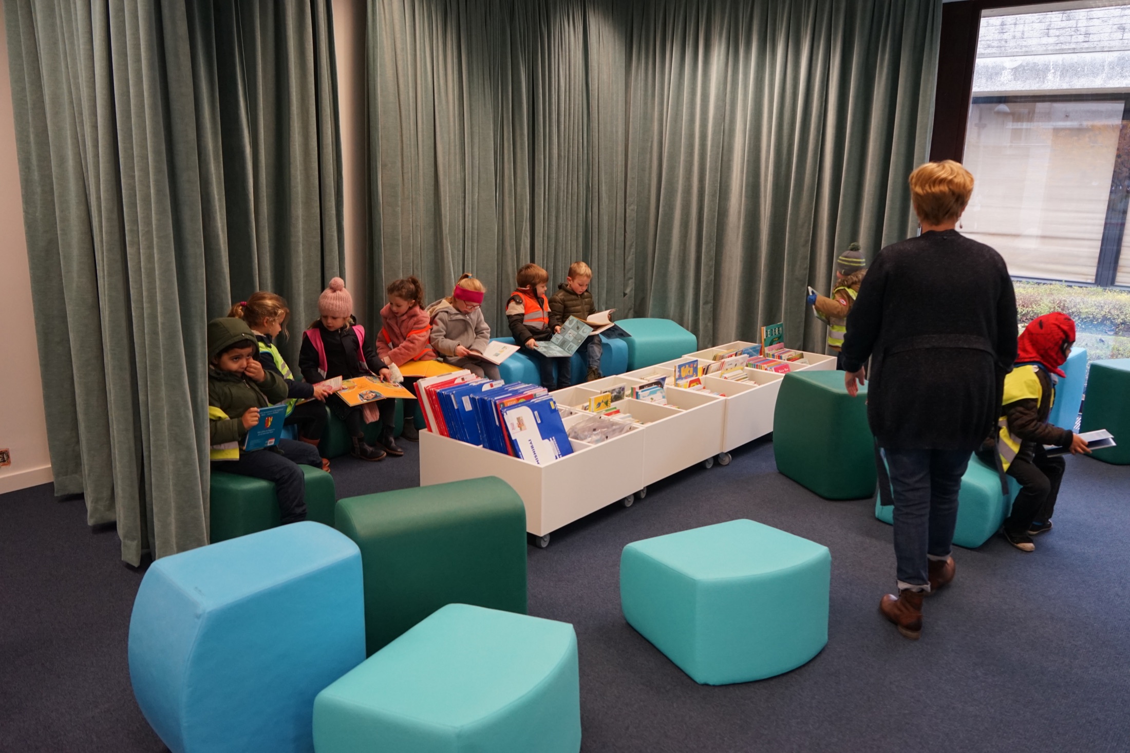 Children using UDA seating at Library Sint-Michiels